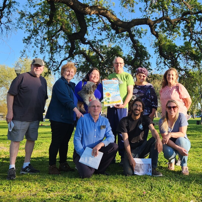 A group of people in a park. The organizing committee for Stockton Earth Day.