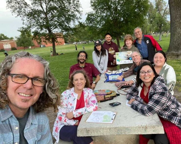 A group of people in a park. The organizing committee for Stockton Earth Day.